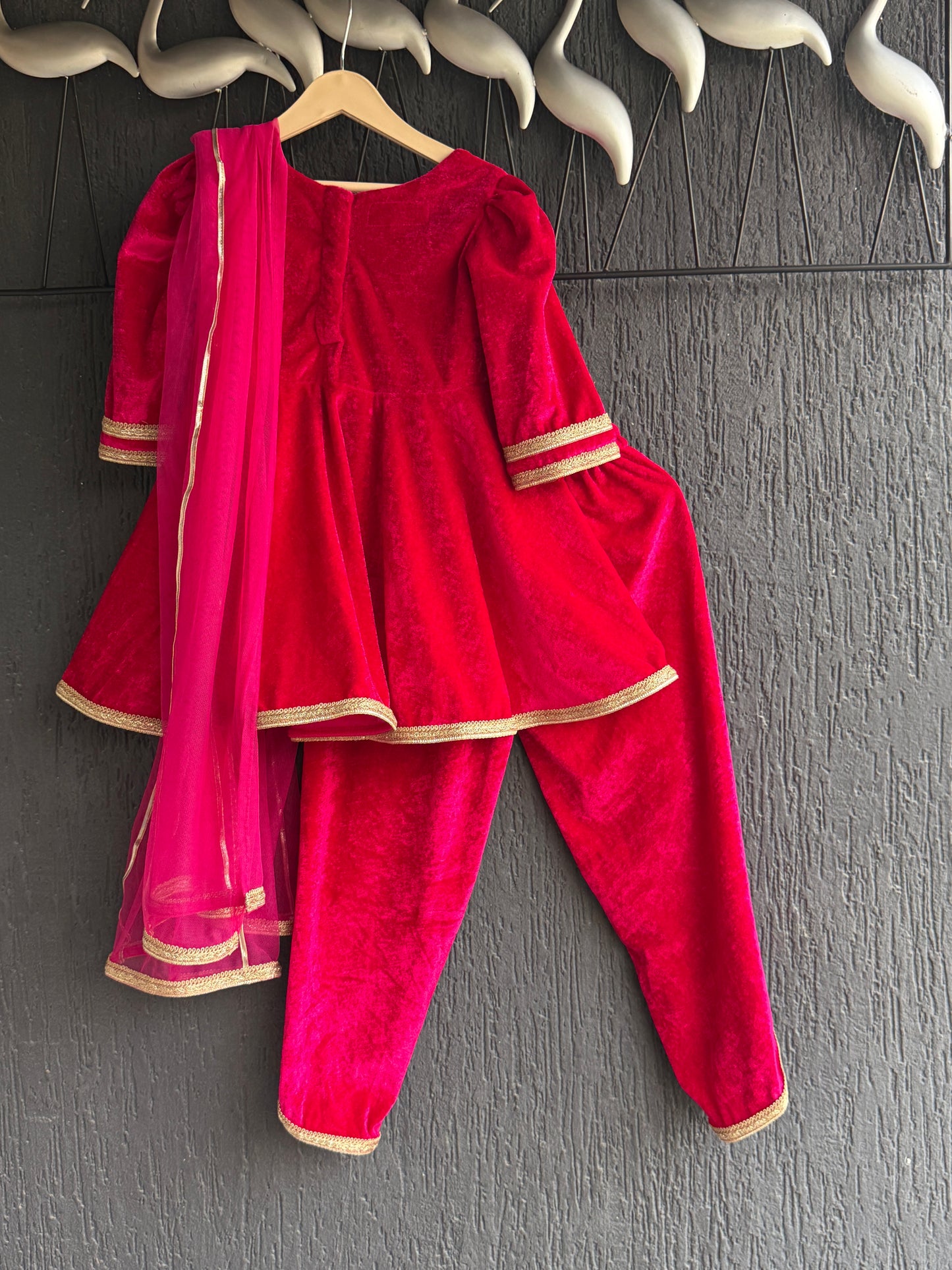 Fuchsia pink frock-style velvet dhoti set with dupatta