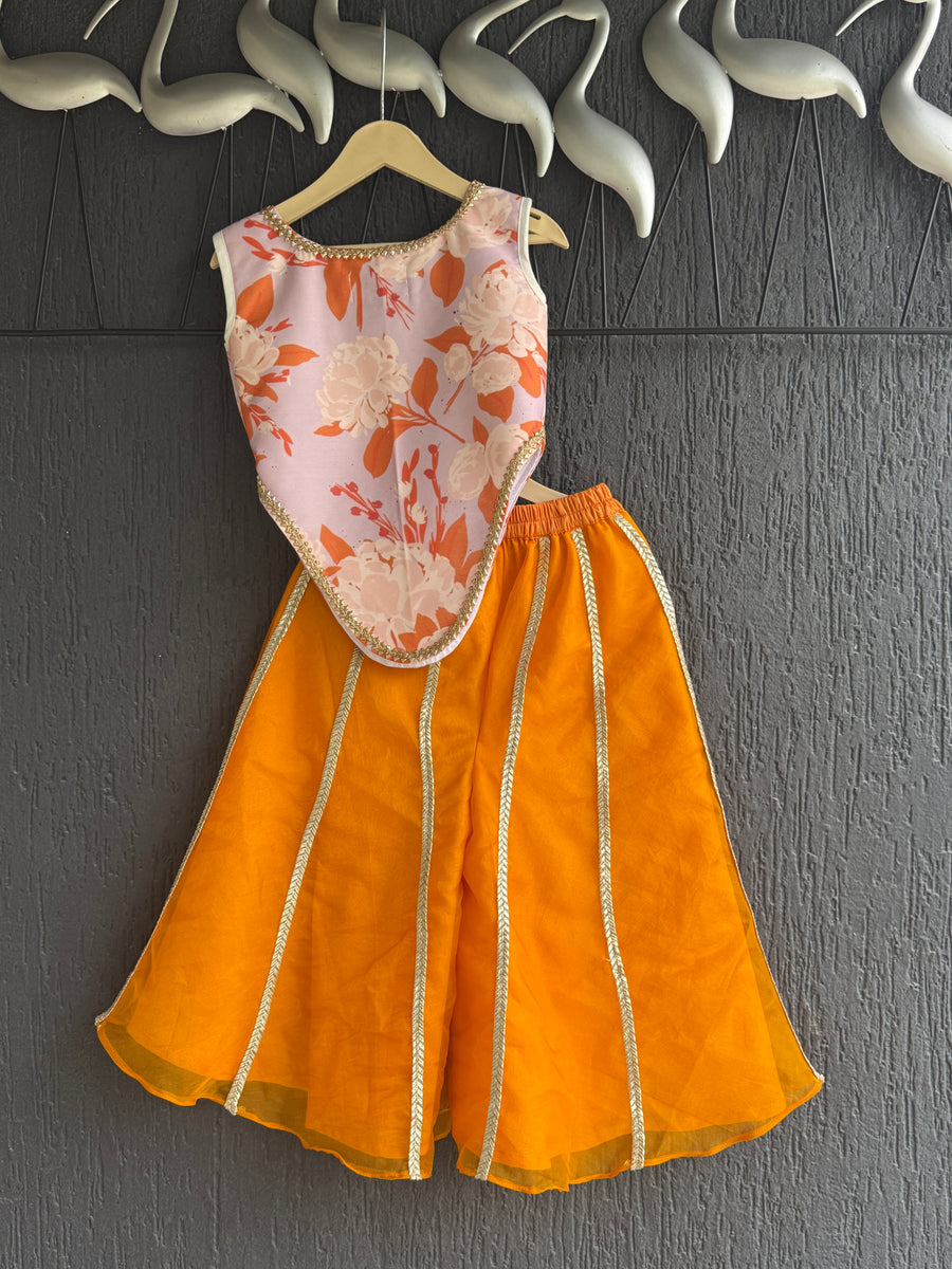Orange asymmetric crop top with flared palazzo set